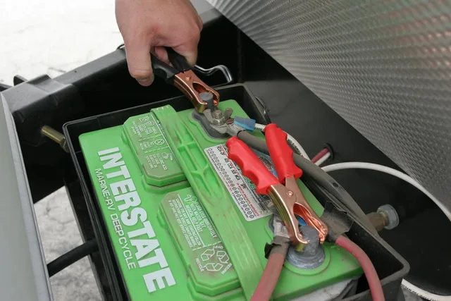 Battery clamps connected to a vehicle terminal, the same connection clamp compressors use