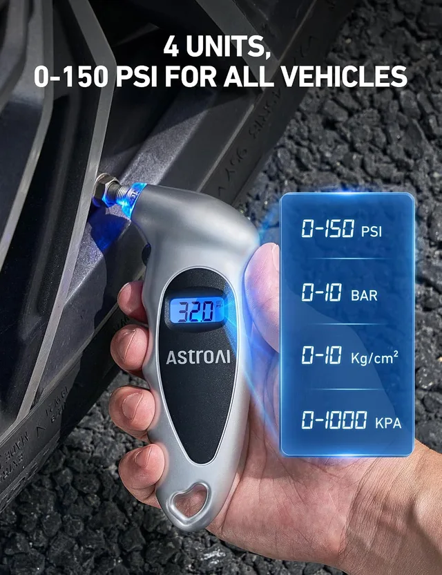 Digital tire gauge checking pressure on a valve stem