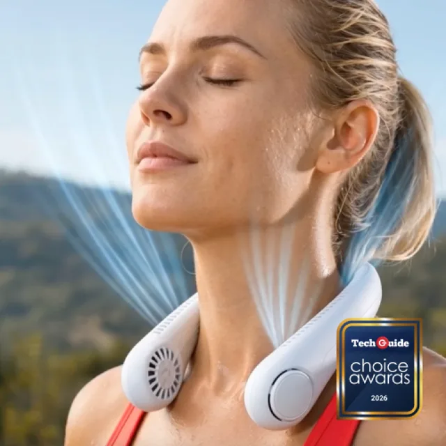 Woman wearing the white FluxoFan bladeless neck fan outdoors with visible airflow