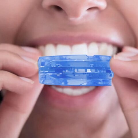 Step 2: insert the molded SleepZee mouthpiece with the curved side up